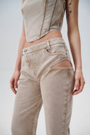Cut out denim pants in sand - Aerenica